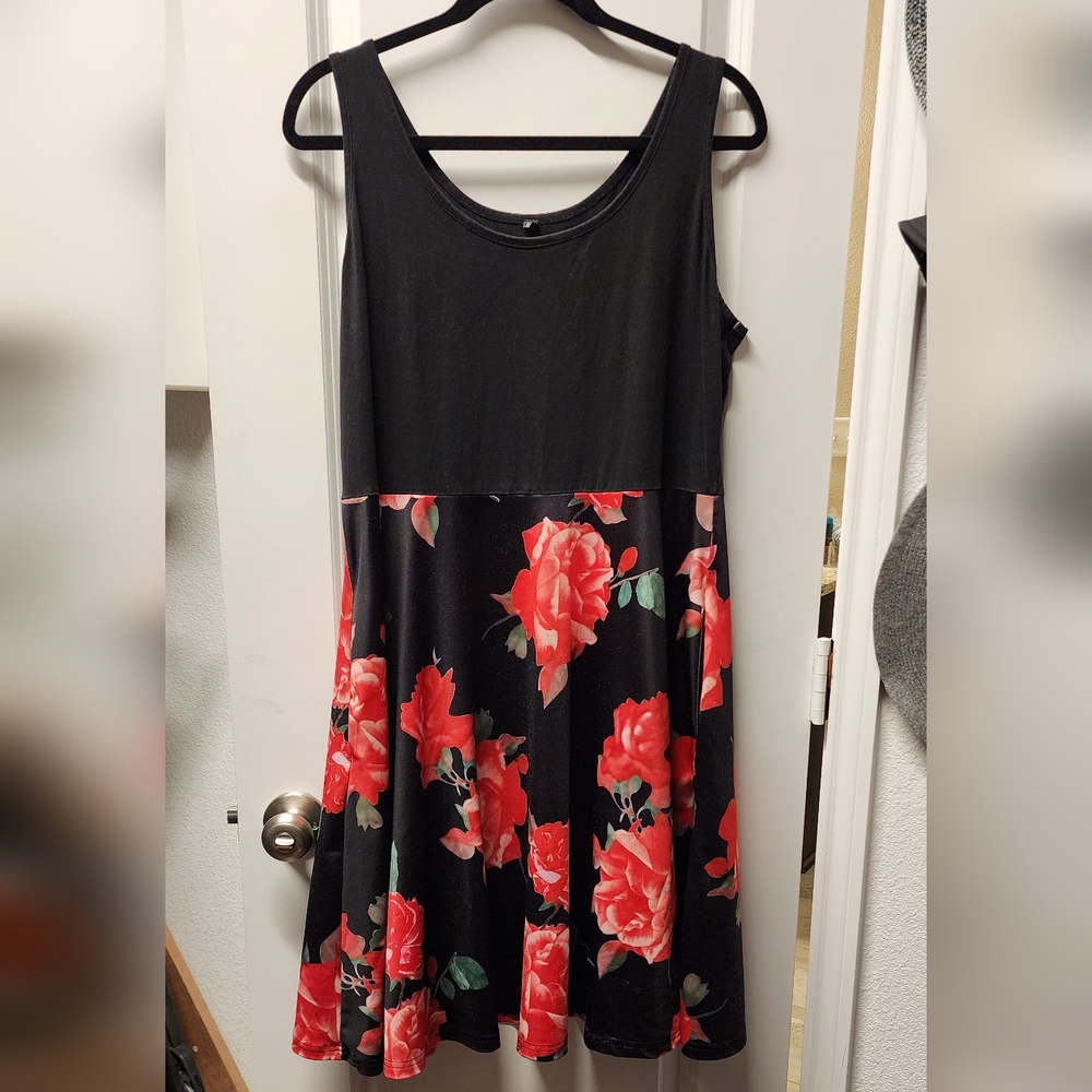 black tank dress with flowers and it has Pockets!